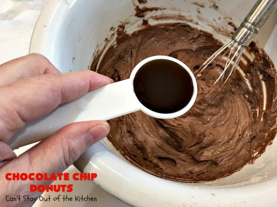Chocolate Chip Donuts | Can't Stay Out of the Kitchen | these spectacular #donuts are filled with miniature #ChocolateChips. They're glazed with a #chocolate icing and sprinkled with chocolate #sprinkles on top. Mouthwatering #breakfast for #holidays like #MothersDay or #FathersDay. #HolidayBreakfast #FathersDayBreakfast #MothersDayBreakfast #ChocolateChipDonuts