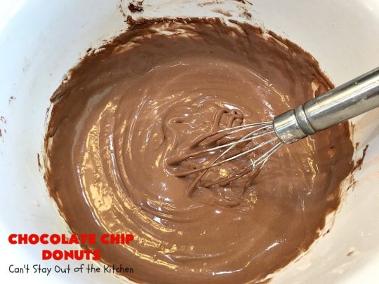 Chocolate Chip Donuts | Can't Stay Out of the Kitchen | these spectacular #donuts are filled with miniature #ChocolateChips. They're glazed with a #chocolate icing and sprinkled with chocolate #sprinkles on top. Mouthwatering #breakfast for #holidays like #MothersDay or #FathersDay. #HolidayBreakfast #FathersDayBreakfast #MothersDayBreakfast #ChocolateChipDonuts