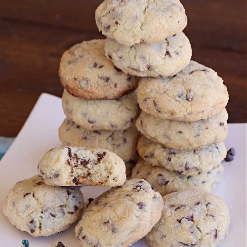 Chocolate Chip Meltaways | Can't Stay Out of the Kitchen | Prepare yourself for the ultimate #MeltInYourMouthCookie! These lovely #SugarCookies include two bags of #ChocolateChips so they're #chocolaty as well as decadent & just dissolve in your mouth! Every bite will cure your sweet tooth cravings. Perfect #dessert for #tailgating parties, potlucks or a #ChristmasCookieExchange. #chocolate #ChocolateDessert #ChocolateChipMeltaways