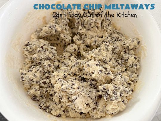 Chocolate Chip Meltaways | Can't Stay Out of the Kitchen | Prepare yourself for the ultimate #MeltInYourMouthCookie! These lovely #SugarCookies include two bags of #ChocolateChips so they're #chocolaty as well as decadent & just dissolve in your mouth! Every bite will cure your sweet tooth cravings. Perfect #dessert for #tailgating parties, potlucks or a #ChristmasCookieExchange. #chocolate #ChocolateDessert #ChocolateChipMeltaways