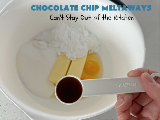 Chocolate Chip Meltaways | Can't Stay Out of the Kitchen | Prepare yourself for the ultimate #MeltInYourMouthCookie! These lovely #SugarCookies include two bags of #ChocolateChips so they're #chocolaty as well as decadent & just dissolve in your mouth! Every bite will cure your sweet tooth cravings. Perfect #dessert for #tailgating parties, potlucks or a #ChristmasCookieExchange. #chocolate #ChocolateDessert #ChocolateChipMeltaways