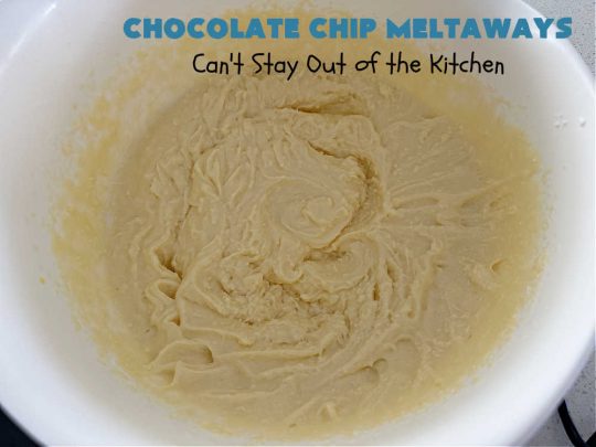 Chocolate Chip Meltaways | Can't Stay Out of the Kitchen | Prepare yourself for the ultimate #MeltInYourMouthCookie! These lovely #SugarCookies include two bags of #ChocolateChips so they're #chocolaty as well as decadent & just dissolve in your mouth! Every bite will cure your sweet tooth cravings. Perfect #dessert for #tailgating parties, potlucks or a #ChristmasCookieExchange. #chocolate #ChocolateDessert #ChocolateChipMeltaways
