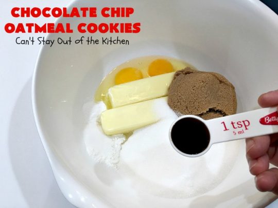Chocolate Chip Oatmeal Cookies | Can't Stay Out of the Kitchen | these #cookies are the best of both worlds! The best #ChocolateChipCookies with the best #OatmealCookies. Mouthwatering & irresistible. #tailgating #dessert #ChocolateDessert #ChristmasCookieExchange #chocolate #ChocolateChips #oatmeal #Holiday #HolidayDessert #ChocolateChipOatmealCookies