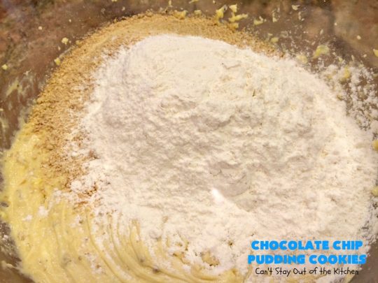 Chocolate Chip Pudding Cookies | Can't Stay Out of the Kitchen | these fabulous #cookies start with the famous #NanaimoBars so they're rich and decadent. They're filled with #chocolate chips, #coconut, #GrahamCracker crumbs, #pecans & buttercream icing made from vanilla pudding! Terrific for #tailgating or #holiday parties. #ChocolateChipPuddingCookies