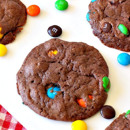 Chocolate M&M Cake Mix Cookies | Can't Stay Out of the Kitchen | Prepare to swoon over these amazing #CakeMix #cookies! They use only 4 ingredients, making them so quick & easy. Wonderful for #holiday or #tailgating parties. #chocolate #ChristmasCookieExchange #MMs #dessert #ChocolateDessert #MMDessert #HolidayDessert #4IngredientRecipe #ChocolateMMCakeMixCookies #CakeMixCookies #EasyHolidayDessert