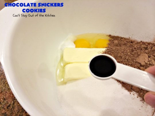 Chocolate Snickers Cookies | Can't Stay Out of the Kitchen | these #chocolate #cookies are fantastic. They're loaded with #SnickersBars so they're filled with #caramel nougat & #peanuts. Terrific for #tailgating or office parties, potlucks or #holiday baking & a #ChristmasCookie Exchange. #dessert #ChocolateDessert #SnickersDessert #HolidayDessert #Snickers #ChocolateSnickersCookies