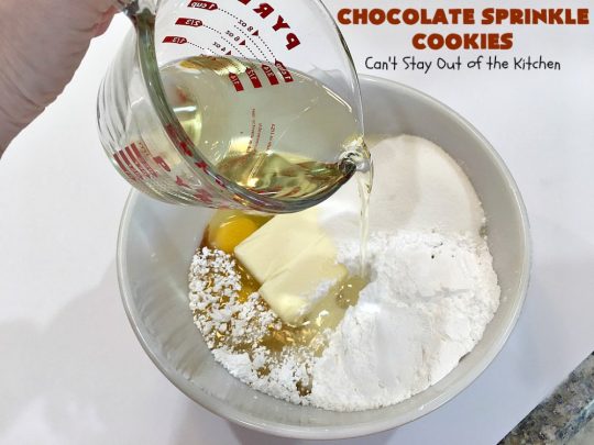 Chocolate Sprinkle Cookies | Can't Stay Out of the Kitchen | these fantastic #SugarCookies are filled with #chocolate #sprinkles. Then they're rolled in more sprinkles before baking. They are soft, rich, melt-in-your-mouth heavenly #cookies! Every bite will have you drooling. #dessert #Holiday #ChocolateDessert #HolidayDessert #HolidayBaking #ChocolateSprinkles #ChristmasCookieExchange #Tailgating #ValentinesDayDessert #TailgatingDessert