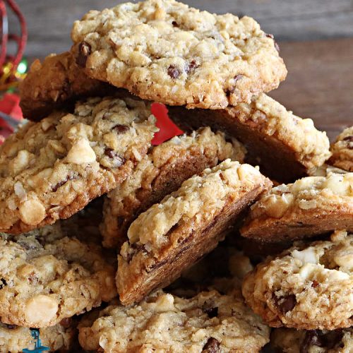 Chocolate Vanilla Oatmeal Cookies | Can't Stay Out of the Kitchen | these scrumptious #OatmealCookies include both #ChocolateChips & #VanillaChips along with #pecans, #oatmeal & #coconut. Indulge yourself with a dose of #chocolate for the #holidays, #tailgating parties, potlucks or any time you're looking for a sweet #dessert. #cookies #ChocolateVanilllaOatmealCookies