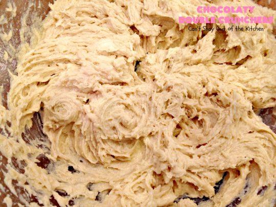 Chocolaty Double Crunchers | Can't Stay Out of the Kitchen | this scrumptious #cookie #recipe is to die for! The cookies contain #oatmeal, #CornFlakes & #coconut. The #chocolate frosting is made from #ChocolateChips & #CreamCheese. Absolutely mouthwatering #dessert for #tailgating, potlucks or #ChristmasCookieExchanges. #ChocolateDessert #WhoopiePie #OatmealWhoopiePie#ChocolatyDoubleCrunchers #SandwichCookie #OatmealSandwichCookie