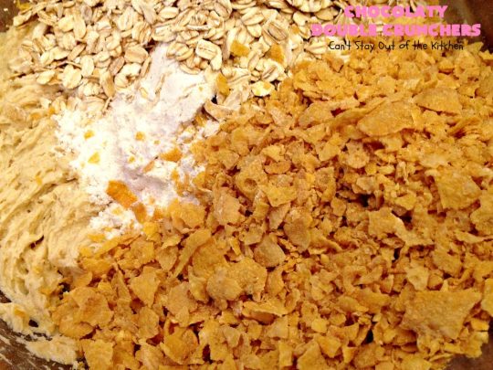 Chocolaty Double Crunchers | Can't Stay Out of the Kitchen | this scrumptious #cookie #recipe is to die for! The cookies contain #oatmeal, #CornFlakes & #coconut. The #chocolate frosting is made from #ChocolateChips & #CreamCheese. Absolutely mouthwatering #dessert for #tailgating, potlucks or #ChristmasCookieExchanges. #ChocolateDessert #WhoopiePie #OatmealWhoopiePie#ChocolatyDoubleCrunchers #SandwichCookie #OatmealSandwichCookie