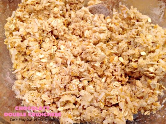 Chocolaty Double Crunchers | Can't Stay Out of the Kitchen | this scrumptious #cookie #recipe is to die for! The cookies contain #oatmeal, #CornFlakes & #coconut. The #chocolate frosting is made from #ChocolateChips & #CreamCheese. Absolutely mouthwatering #dessert for #tailgating, potlucks or #ChristmasCookieExchanges. #ChocolateDessert #WhoopiePie #OatmealWhoopiePie#ChocolatyDoubleCrunchers #SandwichCookie #OatmealSandwichCookie