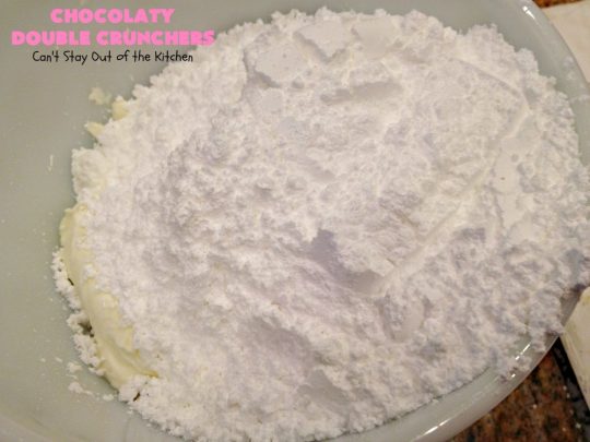 Chocolaty Double Crunchers | Can't Stay Out of the Kitchen | this scrumptious #cookie #recipe is to die for! The cookies contain #oatmeal, #CornFlakes & #coconut. The #chocolate frosting is made from #ChocolateChips & #CreamCheese. Absolutely mouthwatering #dessert for #tailgating, potlucks or #ChristmasCookieExchanges. #ChocolateDessert #WhoopiePie #OatmealWhoopiePie#ChocolatyDoubleCrunchers #SandwichCookie #OatmealSandwichCookie