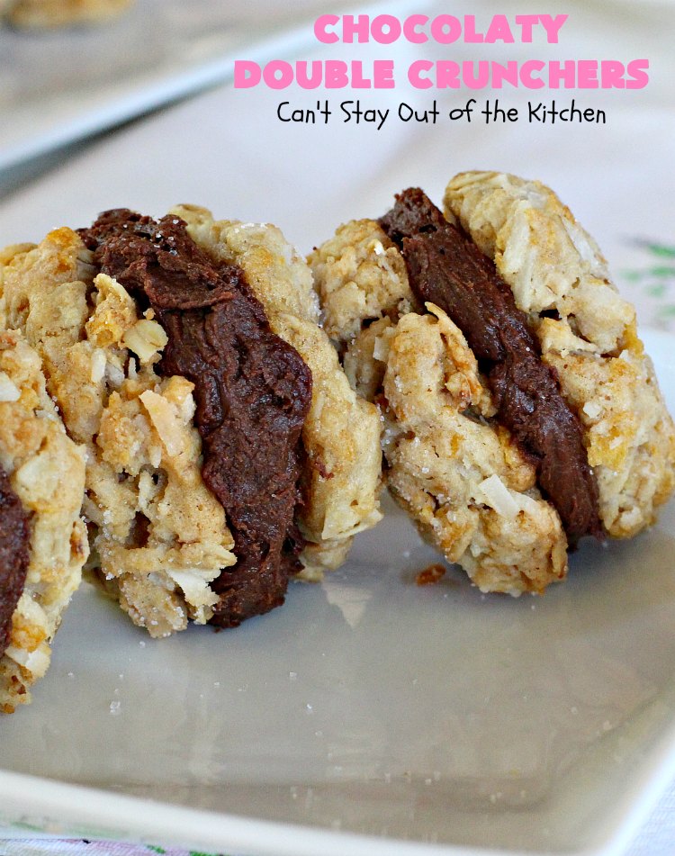 Chocolaty Double Crunchers | Can't Stay Out of the Kitchen | this scrumptious #cookie #recipe is to die for! The cookies contain #oatmeal, #CornFlakes & #coconut. The #chocolate frosting is made from #ChocolateChips & #CreamCheese. Absolutely mouthwatering #dessert for #tailgating, potlucks or #ChristmasCookieExchanges. #ChocolateDessert #WhoopiePie #OatmealWhoopiePie#ChocolatyDoubleCrunchers #SandwichCookie #OatmealSandwichCookie