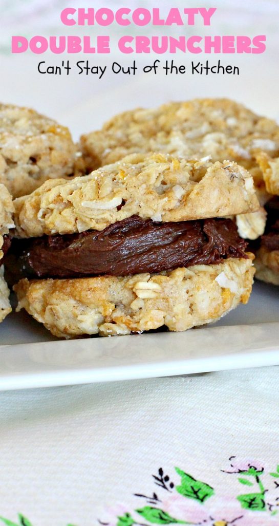 Chocolaty Double Crunchers | Can't Stay Out of the Kitchen | this scrumptious #cookie #recipe is to die for! The cookies contain #oatmeal, #CornFlakes & #coconut. The #chocolate frosting is made from #ChocolateChips & #CreamCheese. Absolutely mouthwatering #dessert for #tailgating, potlucks or #ChristmasCookieExchanges. #ChocolateDessert #WhoopiePie #OatmealWhoopiePie#ChocolatyDoubleCrunchers #SandwichCookie #OatmealSandwichCookie