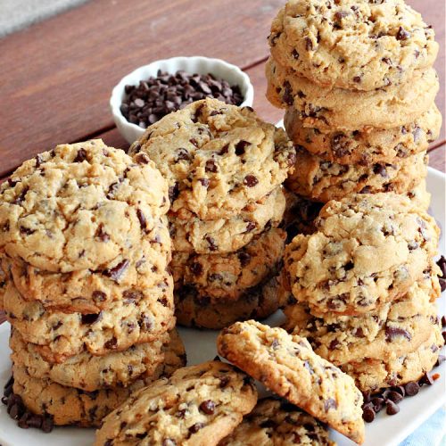 Chocolaty Peanut Butter Cookies | Can't Stay Out of the Kitchen | You'll be drooling from the first bite after one taste of these spectacular #PeanutButterCookies. These include miniature #ChocolateChips so they're loaded with #chocolate & #PeanutButter flavor. Great for #tailgating, potlucks, backyard BBQs & #holiday #baking. Be prepared to swoon! You're gonna want seconds. #HolidayDessert #dessert #ChristmasCookieExchange #cookies #ChocolateDessert #PeanutButterDessert #ChocolatyPeanutButterCookies