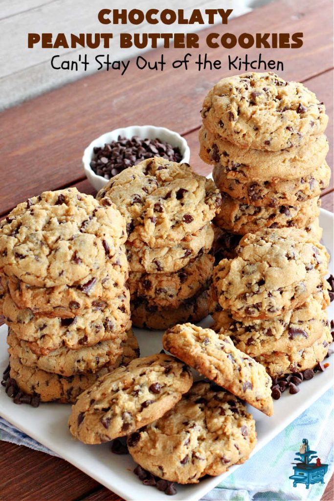 Chocolaty Peanut Butter Cookies | Can't Stay Out of the Kitchen | You'll be drooling from the first bite after one taste of these spectacular #PeanutButterCookies. These include miniature #ChocolateChips so they're loaded with #chocolate & #PeanutButter flavor. Great for #tailgating, potlucks, backyard BBQs & #holiday #baking. Be prepared to swoon! You're gonna want seconds. #HolidayDessert #dessert #ChristmasCookieExchange #cookies #ChocolateDessert #PeanutButterDessert #ChocolatyPeanutButterCookies