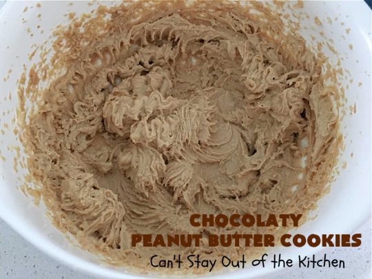 Chocolaty Peanut Butter Cookies | Can't Stay Out of the Kitchen | You'll be drooling from the first bite after one taste of these spectacular #PeanutButterCookies. These include miniature #ChocolateChips so they're loaded with #chocolate & #PeanutButter flavor. Great for #tailgating, potlucks, backyard BBQs & #holiday #baking. Be prepared to swoon! You're gonna want seconds. #HolidayDessert #dessert #ChristmasCookieExchange #cookies #ChocolateDessert #PeanutButterDessert #ChocolatyPeanutButterCookies