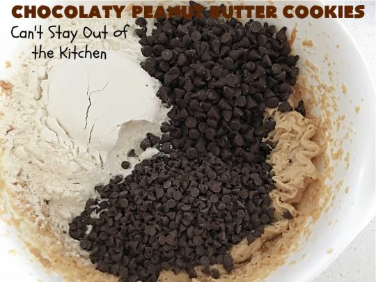 Chocolaty Peanut Butter Cookies | Can't Stay Out of the Kitchen | You'll be drooling from the first bite after one taste of these spectacular #PeanutButterCookies. These include miniature #ChocolateChips so they're loaded with #chocolate & #PeanutButter flavor. Great for #tailgating, potlucks, backyard BBQs & #holiday #baking. Be prepared to swoon! You're gonna want seconds. #HolidayDessert #dessert #ChristmasCookieExchange #cookies #ChocolateDessert #PeanutButterDessert #ChocolatyPeanutButterCookies