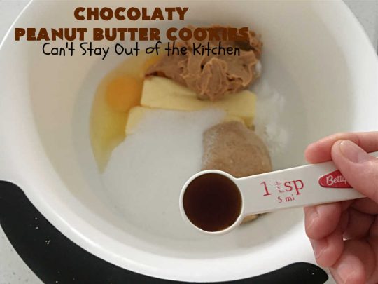 Chocolaty Peanut Butter Cookies | Can't Stay Out of the Kitchen | You'll be drooling from the first bite after one taste of these spectacular #PeanutButterCookies. These include miniature #ChocolateChips so they're loaded with #chocolate & #PeanutButter flavor. Great for #tailgating, potlucks, backyard BBQs & #holiday #baking. Be prepared to swoon! You're gonna want seconds. #HolidayDessert #dessert #ChristmasCookieExchange #cookies #ChocolateDessert #PeanutButterDessert #ChocolatyPeanutButterCookies