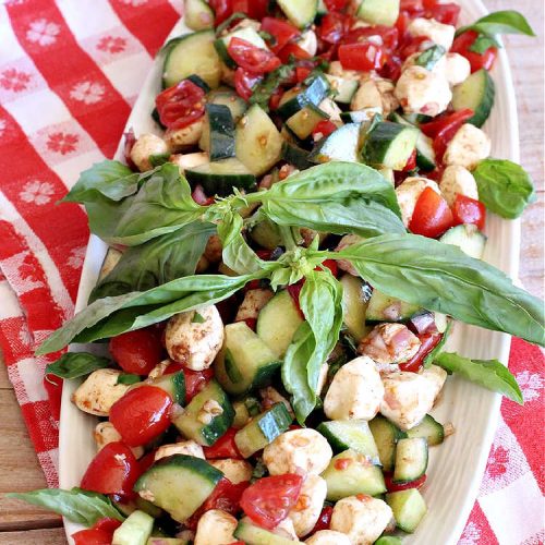 Chopped Cucumber Caprese Salad | Can't Stay Out of the Kitchen | this delightful #SugarFree #salad includes #tomatoes #MozzarellaPearls #FreshBasil and #EnglishCucumbers in a wonderful & easy-to-make #balsamic #SaladDressing. Wonderful for potlucks, company or #holiday dinners. #GlutenFree #caprese #CapreseSalad #ChoppedSalad #ChoppedCucumberCapreseSalad