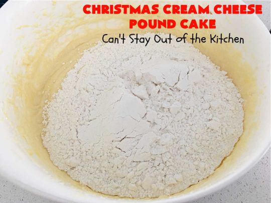 Christmas Cream Cheese Pound Cake | Can't Stay Out of the Kitchen | this luscious #PoundCake is made with #CreamCheese & #ParadiseFruitCompany's #CandiedPineapple. It's absolutely amazing. The #icing has #PineappleExtract so it pops with flavor. Great for #holiday parties & get-togethers. #Paradise #ParadiseFruitCo #dessert #Cake #HolidayDessert #PineappleDessert #Christmas #ChristmasCreamCheesePoundCake