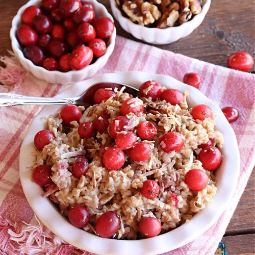 Coconut Cranberry Overnight Oatmeal | Can't Stay Out of the Kitchen | Enjoy a hearty #breakfast with this delicious #OvernightOatmeal #recipe. This one includes #coconut (if you like it), #walnuts & fresh #cranberries. Cook in your programmable #SlowCooker & you'll have a filling, satisfying #breakfast or #brunch waiting for you in the morning! #HolidayBreakfast #oatmeal #SteelCutOats #CoconutCranberryOvernightOatmeal