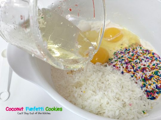 Coconut Funfetti Cookies | Can't Stay Out of the Kitchen | these marvelous #cookies are filled with #rainbowsprinkles and #coconut and so easy to make since they start with a #cakemix. #dessert