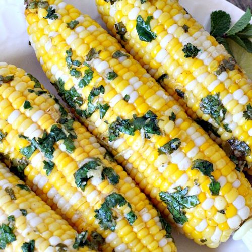 Corn-on-the-Cob with Cilantro-Lime Butter | Can't Stay Out of the Kitchen | this terrific #corn recipe is spread with a delicious #cilantro lime butter & then baked in the oven. It's an easy & tasty way to serve corn-on-the cob for #July4th #LaborDay or other summer barbecues. #glutenfree