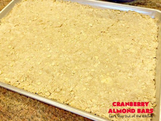 Paula Deen's Cranberry Almond Bars | Can't Stay Out of the Kitchen | fabulous #PaulaDeen #cookie recipe with a streusel crust and topping. The filling is made with fresh #cranberries & #pineapple preserves & #almonds on top. This is a terrific #dessert for #Christmas baking.
