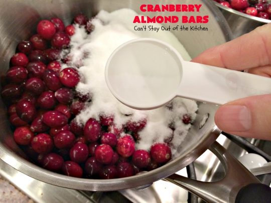 Paula Deen's Cranberry Almond Bars | Can't Stay Out of the Kitchen | fabulous #PaulaDeen #cookie recipe with a streusel crust and topping. The filling is made with fresh #cranberries & #pineapple preserves & #almonds on top. This is a terrific #dessert for #Christmas baking.