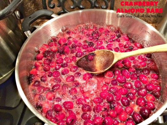 Paula Deen's Cranberry Almond Bars | Can't Stay Out of the Kitchen | fabulous #PaulaDeen #cookie recipe with a streusel crust and topping. The filling is made with fresh #cranberries & #pineapple preserves & #almonds on top. This is a terrific #dessert for #Christmas baking.