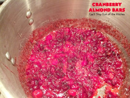Paula Deen's Cranberry Almond Bars | Can't Stay Out of the Kitchen | fabulous #PaulaDeen #cookie recipe with a streusel crust and topping. The filling is made with fresh #cranberries & #pineapple preserves & #almonds on top. This is a terrific #dessert for #Christmas baking.