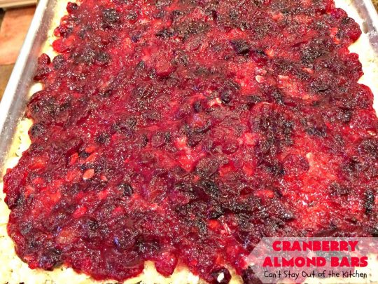 Paula Deen's Cranberry Almond Bars | Can't Stay Out of the Kitchen | fabulous #PaulaDeen #cookie recipe with a streusel crust and topping. The filling is made with fresh #cranberries & #pineapple preserves & #almonds on top. This is a terrific #dessert for #Christmas baking.
