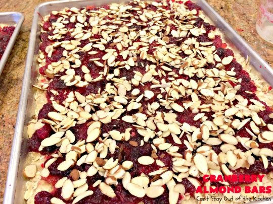 Paula Deen's Cranberry Almond Bars | Can't Stay Out of the Kitchen | fabulous #PaulaDeen #cookie recipe with a streusel crust and topping. The filling is made with fresh #cranberries & #pineapple preserves & #almonds on top. This is a terrific #dessert for #Christmas baking.