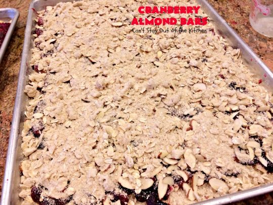 Paula Deen's Cranberry Almond Bars | Can't Stay Out of the Kitchen | fabulous #PaulaDeen #cookie recipe with a streusel crust and topping. The filling is made with fresh #cranberries & #pineapple preserves & #almonds on top. This is a terrific #dessert for #Christmas baking.