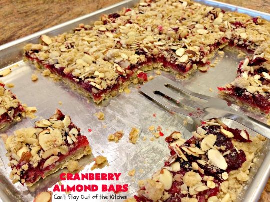 Paula Deen's Cranberry Almond Bars | Can't Stay Out of the Kitchen | fabulous #PaulaDeen #cookie recipe with a streusel crust and topping. The filling is made with fresh #cranberries & #pineapple preserves & #almonds on top. This is a terrific #dessert for #Christmas baking.