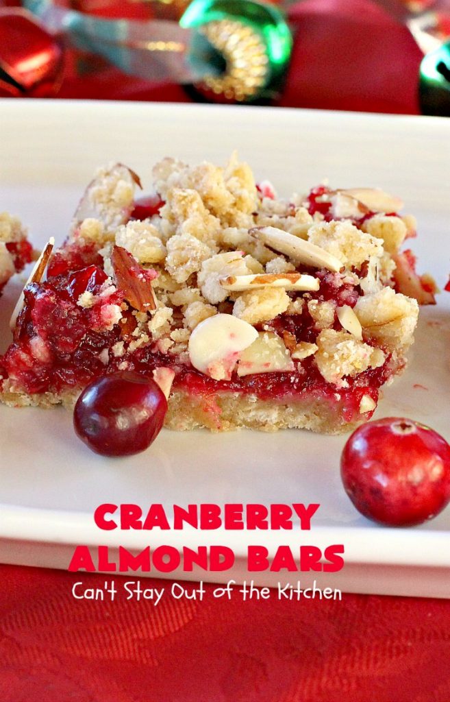 Paula Deen's Cranberry Almond Bars | Can't Stay Out of the Kitchen | fabulous #PaulaDeen #cookie recipe with a streusel crust and topping. The filling is made with fresh #cranberries & #pineapple preserves & #almonds on top. This is a terrific #dessert for #Christmas baking.