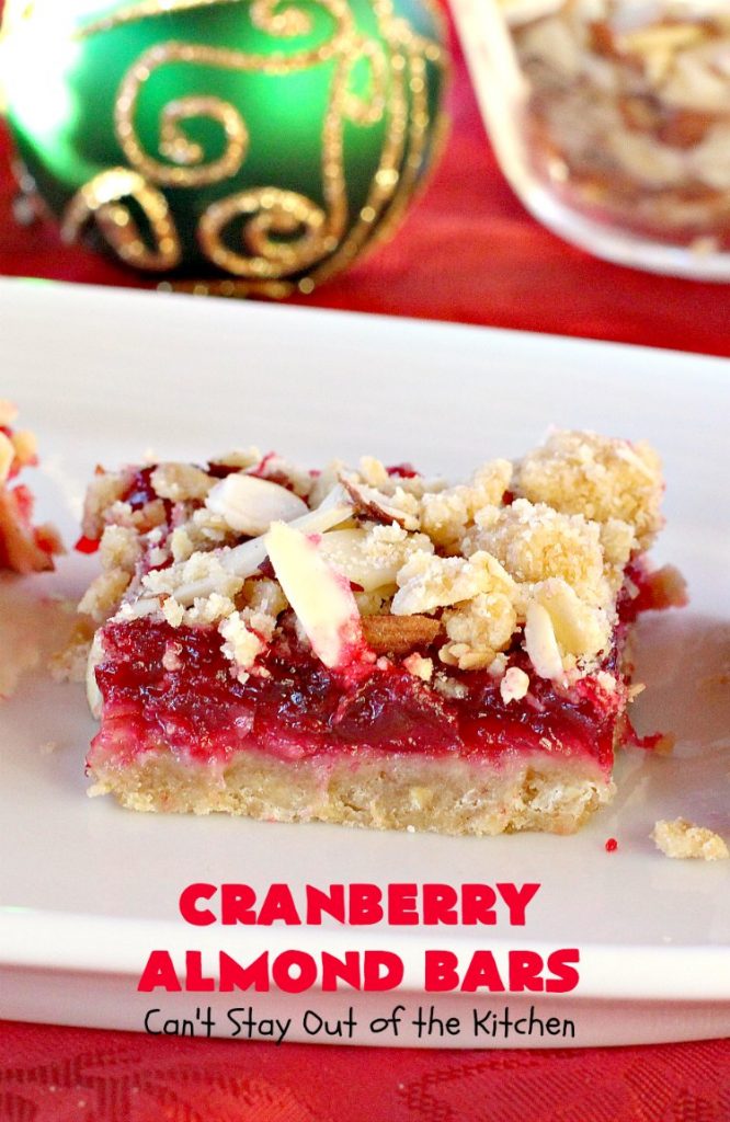 Paula Deen's Cranberry Almond Bars | Can't Stay Out of the Kitchen | fabulous #PaulaDeen #cookie recipe with a streusel crust and topping. The filling is made with fresh #cranberries & #pineapple preserves & #almonds on top. This is a terrific #dessert for #Christmas baking.