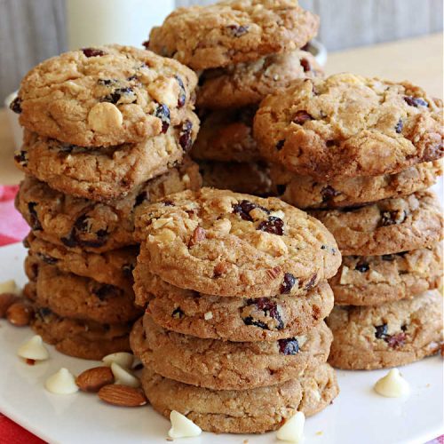 Cranberry Almond White Chocolate Cookies | Can't Stay Out of the Kitchen | these delectable #cookies start from a favorite #ChocolateChipCookie #recipe but use #WhiteChocolateChips, #almonds & dried #cranberries. They're perfect for #holiday parties, potlucks, #tailgating & entertaining of any kind. #chocolate #WhiteChocolate #craisins #dessert #CranberryDessert #ChocolateDessert #AlmondDessert #HolidayDessert #ChristmasCookieExchange #CranberryAlmondWhiteChocolateCookies