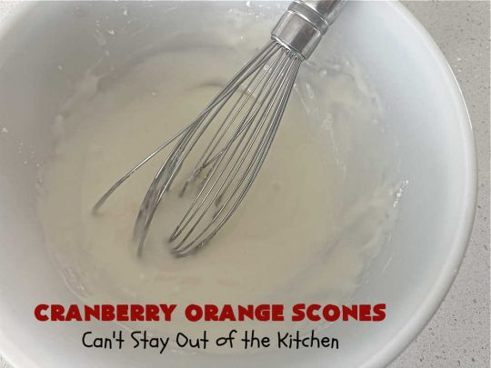 Cranberry Orange Scones | Can't Stay Out of the Kitchen | these luscious #scones have the most spectacular  combination of flavors using fresh #cranberries, #OrangeZest & featuring a luscious #orange icing with more Orange Zest on top. They simply beg to be eaten! You'll be swooning after sinking your teeth into these amazing #CranberryOrangeScones. Great for a weekend, company or #holiday #breakfast or #brunch like #Thanksgiving, #Christmas, #NewYearsDay or #ValentinesDay.