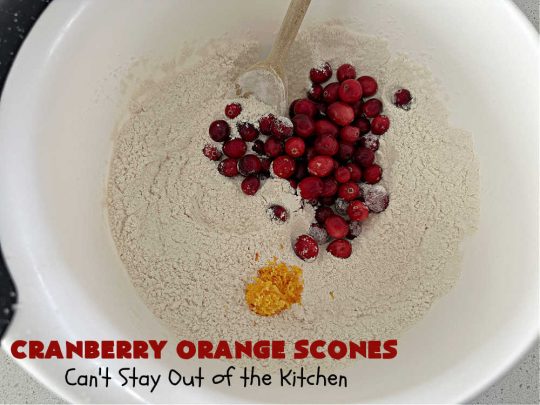 Cranberry Orange Scones | Can't Stay Out of the Kitchen | these luscious #scones have the most spectacular combination of flavors using fresh #cranberries, #OrangeZest & featuring a luscious #orange icing with more Orange Zest on top. They simply beg to be eaten! You'll be swooning after sinking your teeth into these amazing #CranberryOrangeScones. Great for a weekend, company or #holiday #breakfast or #brunch like #Thanksgiving, #Christmas, #NewYearsDay or #ValentinesDay.