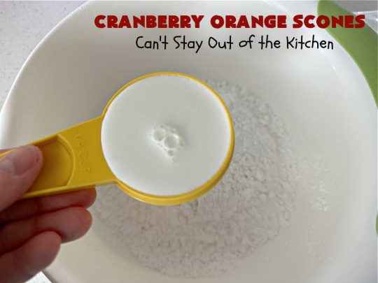 Cranberry Orange Scones | Can't Stay Out of the Kitchen | these luscious #scones have the most spectacular combination of flavors using fresh #cranberries, #OrangeZest & featuring a luscious #orange icing with more Orange Zest on top. They simply beg to be eaten! You'll be swooning after sinking your teeth into these amazing #CranberryOrangeScones. Great for a weekend, company or #holiday #breakfast or #brunch like #Thanksgiving, #Christmas, #NewYearsDay or #ValentinesDay.