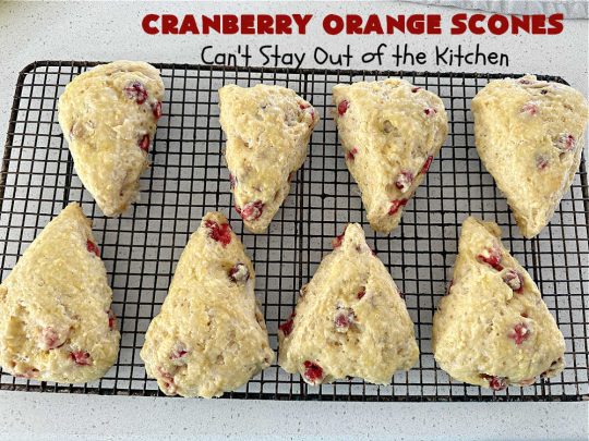 Cranberry Orange Scones | Can't Stay Out of the Kitchen | these luscious #scones have the most spectacular combination of flavors using fresh #cranberries, #OrangeZest & featuring a luscious #orange icing with more Orange Zest on top. They simply beg to be eaten! You'll be swooning after sinking your teeth into these amazing #CranberryOrangeScones. Great for a weekend, company or #holiday #breakfast or #brunch like #Thanksgiving, #Christmas, #NewYearsDay or #ValentinesDay.