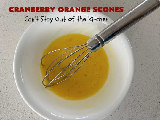 Cranberry Orange Scones | Can't Stay Out of the Kitchen | these luscious #scones have the most spectacular combination of flavors using fresh #cranberries, #OrangeZest & featuring a luscious #orange icing with more Orange Zest on top. They simply beg to be eaten! You'll be swooning after sinking your teeth into these amazing #CranberryOrangeScones. Great for a weekend, company or #holiday #breakfast or #brunch like #Thanksgiving, #Christmas, #NewYearsDay or #ValentinesDay.