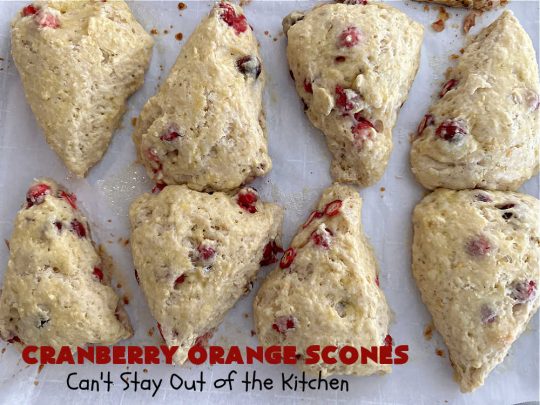 Cranberry Orange Scones | Can't Stay Out of the Kitchen | these luscious #scones have the most spectacular combination of flavors using fresh #cranberries, #OrangeZest & featuring a luscious #orange icing with more Orange Zest on top. They simply beg to be eaten! You'll be swooning after sinking your teeth into these amazing #CranberryOrangeScones. Great for a weekend, company or #holiday #breakfast or #brunch like #Thanksgiving, #Christmas, #NewYearsDay or #ValentinesDay.