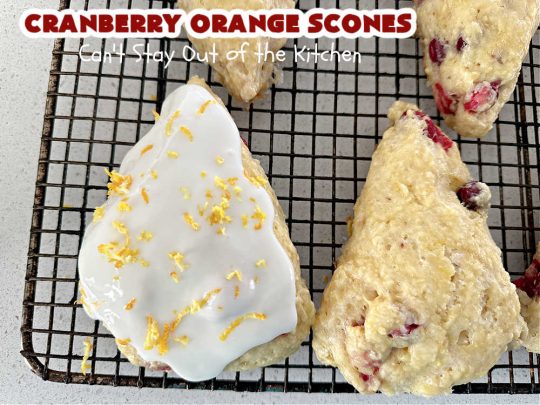 Cranberry Orange Scones | Can't Stay Out of the Kitchen | these luscious #scones have the most spectacular combination of flavors using fresh #cranberries, #OrangeZest & featuring a luscious #orange icing with more Orange Zest on top. They simply beg to be eaten! You'll be swooning after sinking your teeth into these amazing #CranberryOrangeScones. Great for a weekend, company or #holiday #breakfast or #brunch like #Thanksgiving, #Christmas, #NewYearsDay or #ValentinesDay.