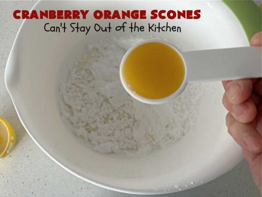 Cranberry Orange Scones | Can't Stay Out of the Kitchen | these luscious #scones have the most spectacular combination of flavors using fresh #cranberries, #OrangeZest & featuring a luscious #orange icing with more Orange Zest on top. They simply beg to be eaten! You'll be swooning after sinking your teeth into these amazing #CranberryOrangeScones. Great for a weekend, company or #holiday #breakfast or #brunch like #Thanksgiving, #Christmas, #NewYearsDay or #ValentinesDay.
