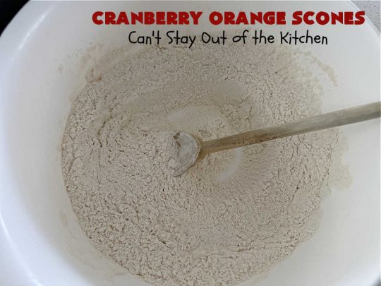 Cranberry Orange Scones | Can't Stay Out of the Kitchen | these luscious #scones have the most spectacular combination of flavors using fresh #cranberries, #OrangeZest & featuring a luscious #orange icing with more Orange Zest on top. They simply beg to be eaten! You'll be swooning after sinking your teeth into these amazing #CranberryOrangeScones. Great for a weekend, company or #holiday #breakfast or #brunch like #Thanksgiving, #Christmas, #NewYearsDay or #ValentinesDay.