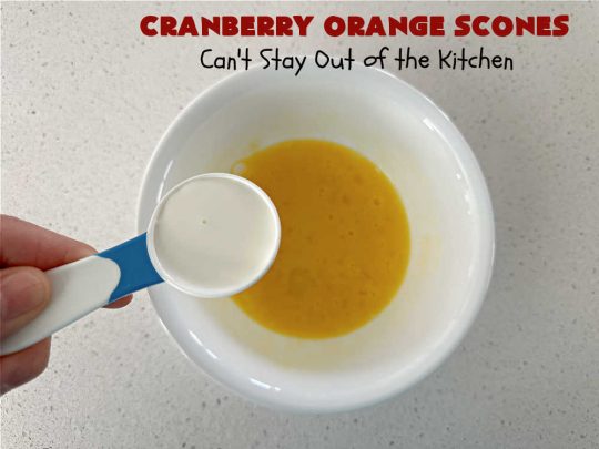 Cranberry Orange Scones | Can't Stay Out of the Kitchen | these luscious #scones have the most spectacular combination of flavors using fresh #cranberries, #OrangeZest & featuring a luscious #orange icing with more Orange Zest on top. They simply beg to be eaten! You'll be swooning after sinking your teeth into these amazing #CranberryOrangeScones. Great for a weekend, company or #holiday #breakfast or #brunch like #Thanksgiving, #Christmas, #NewYearsDay or #ValentinesDay.