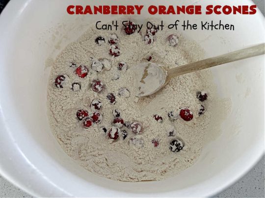 Cranberry Orange Scones | Can't Stay Out of the Kitchen | these luscious #scones have the most spectacular combination of flavors using fresh #cranberries, #OrangeZest & featuring a luscious #orange icing with more Orange Zest on top. They simply beg to be eaten! You'll be swooning after sinking your teeth into these amazing #CranberryOrangeScones. Great for a weekend, company or #holiday #breakfast or #brunch like #Thanksgiving, #Christmas, #NewYearsDay or #ValentinesDay.